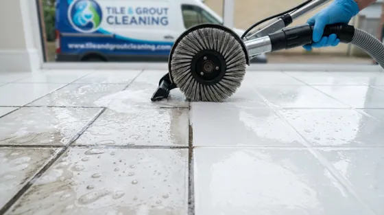 Tile and grout cleaning showing a cleaned section beside a soiled one